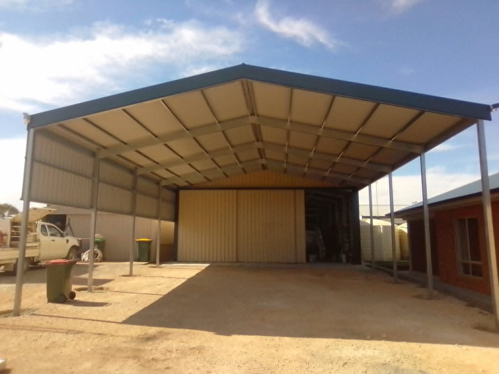 Open-bay carport built by Trevarth Garages